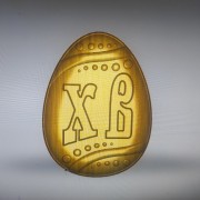 Фото пряничной формына пасху с надписью ХВ в виде яйца