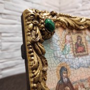 Фото иконы под старину Петра и Февронии с иглицами и зелеными камнями левый верхний камень